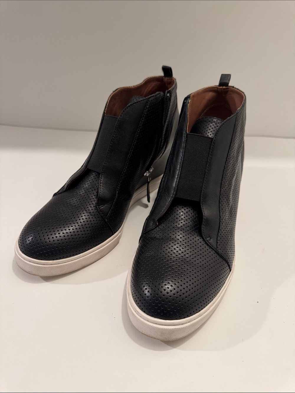L.Paolo Women’s Black Leather Perforated Wedge Sneakers